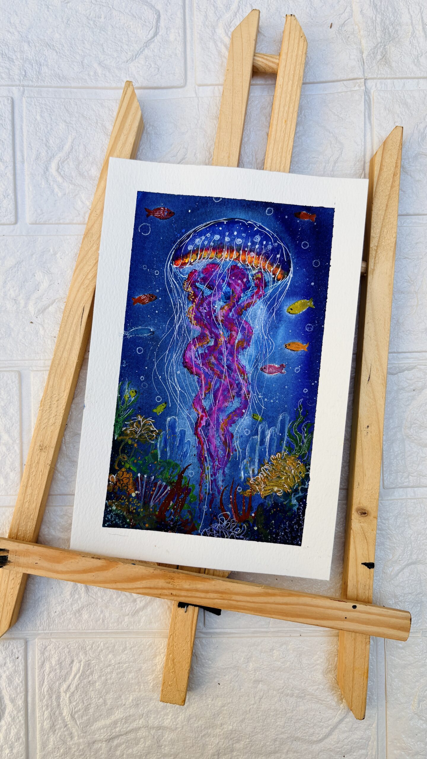 Jellyfish Dreamscape Colorful underwater watercolor painting of a glowing jellyfish surrounded by fish and coral